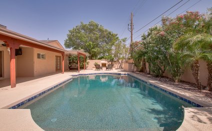 Backyard features a pebble-tec